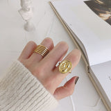 Multi-layered adjustable open ring